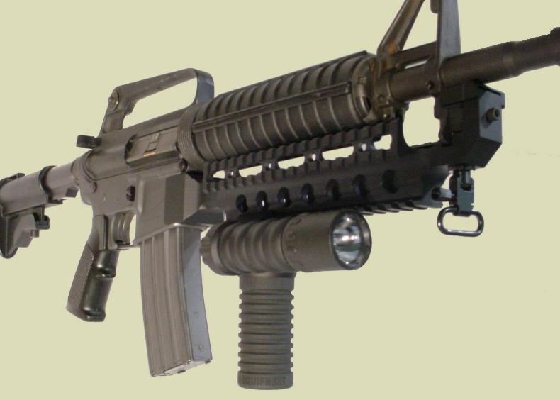 M4 rifle with the RM Rail Grip with the Tactical Light mounted to the Fast Rail.